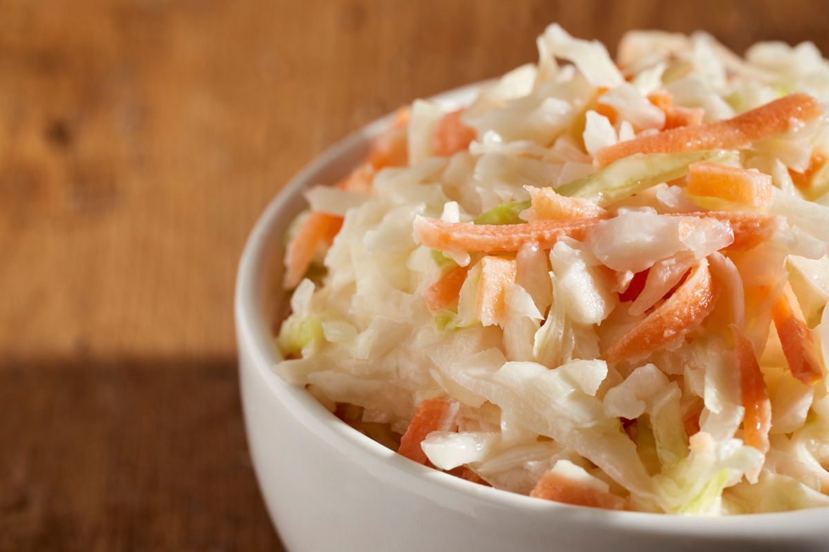 Coleslaw salad in a white bowl