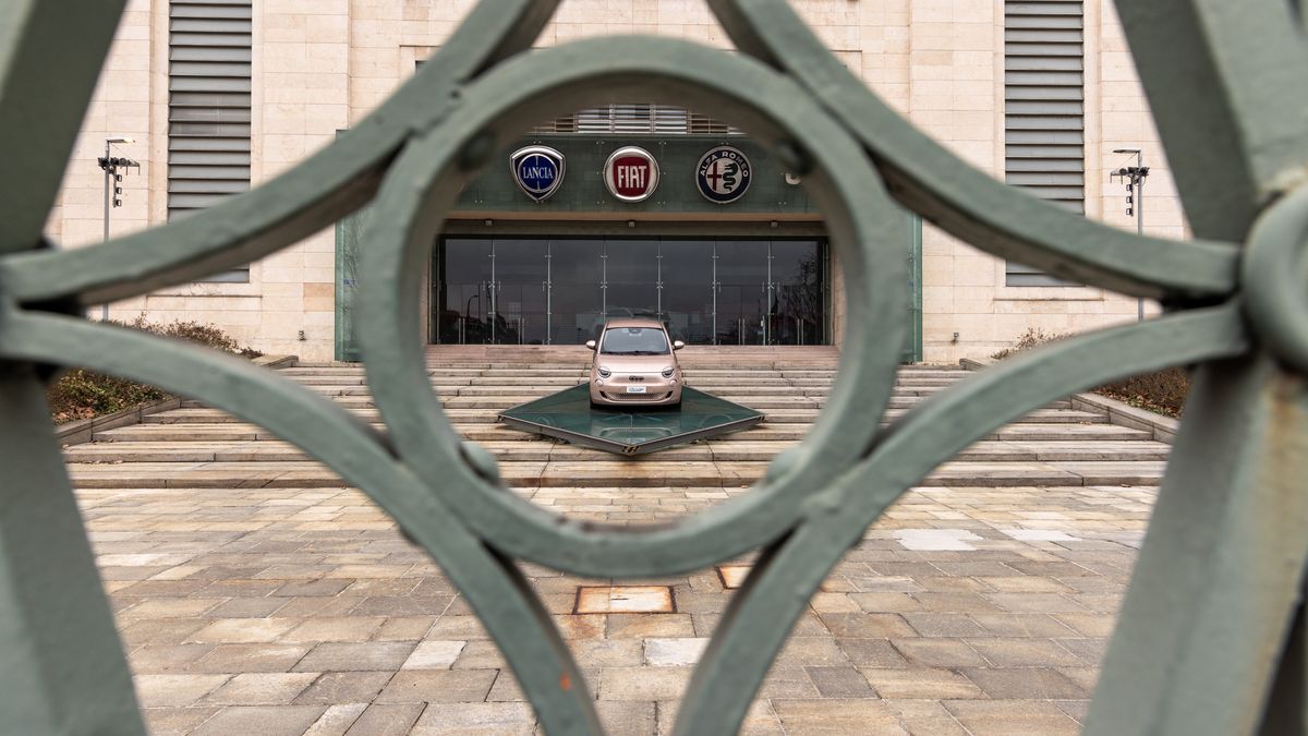 A Fiat 500e is being displayed at the entrance to the Stellantis factory in Mirafiori, Turin, Italy, on February 24, 2024. The Ecological Left (Sinistra Ecologista) and the Left Greens (Verdi) are organizing a march around the FIAT Mirafiori plant, a significant symbol of Italian industry, demanding complete and quality employment opportunities during the ecological transition phase and calling for a halt to relocations and layoffs. (Photo by Mauro Ujetto/NurPhoto via Getty Images)