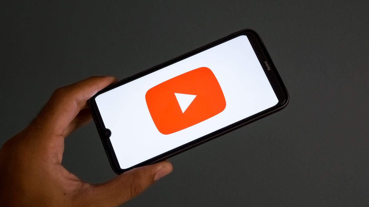 The YouTube logo appears on a smartphone screen in this photo illustration in Athens, Greece, on August 5, 2025. (Photo by Nikolas Kokovlis/NurPhoto via Getty Images)