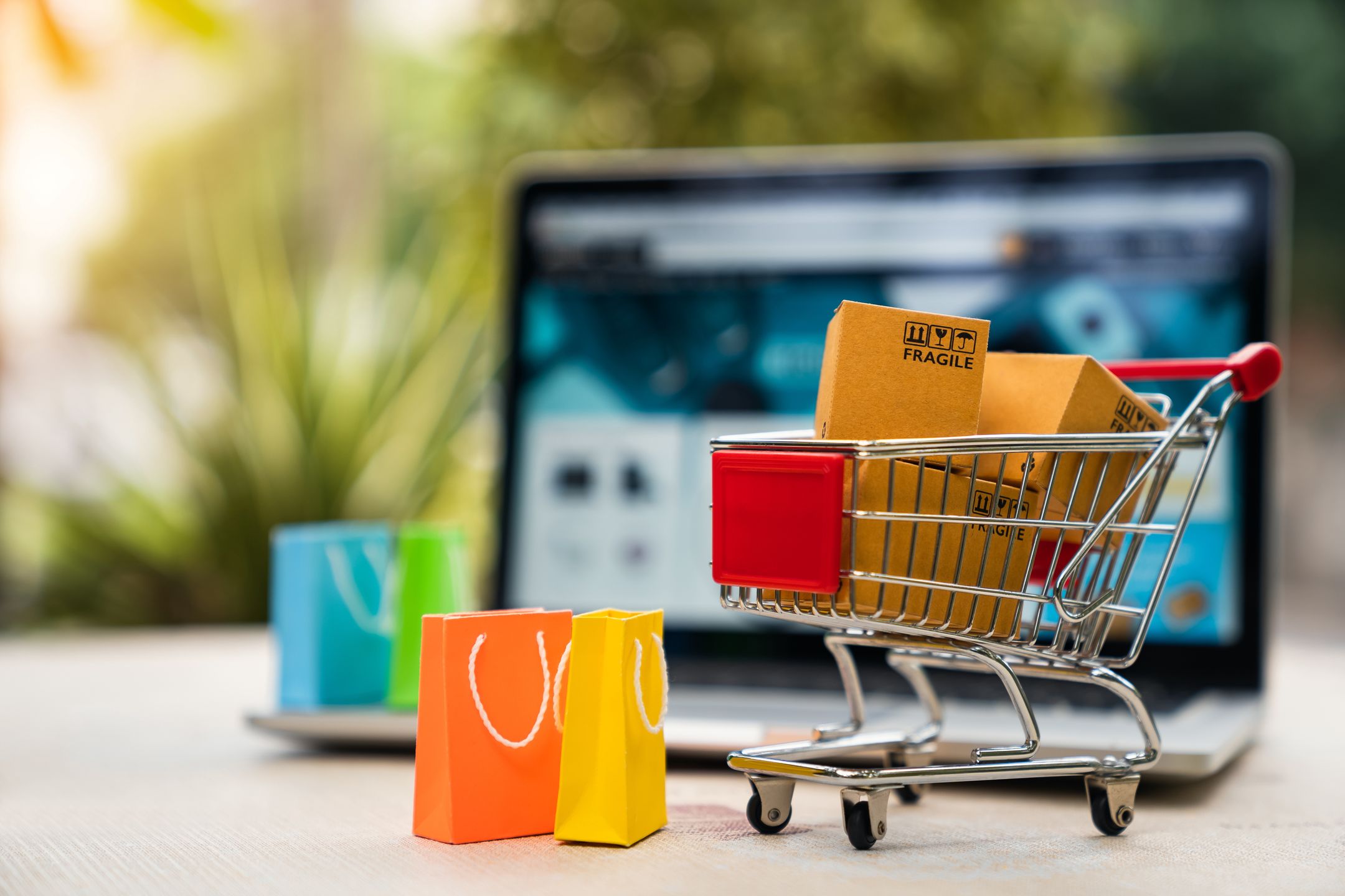 Product package boxes in cart with shopping bag and laptop computer with blurred web store shop on screen for online shopping and delivery concept
online, shop, payment, ecommerce, marketplace, shopping, cart, concept, laptop, delivery, computer, boxes, web, sale, bag, buy, commerce, price, shipping, package, purchase, order, business, background, service, technology, internet, website, store, marketing, consumer, retail, e-commerce, home, market, customer, deliver, product, finance, packaging