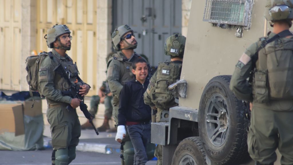 Israeli forces raid Hebron city of West Bank
HEBRON, WEST BANK - OCTOBER 21:Israeli soldiers detained a child during a raid in Wadi al-Tuffah street as Israeli forces raid the city in an attempt to provide protection to Israelis in Palestinian land to visit a historical site, in Hebron, West Bank on October 21, 2024. (Photo by Amer Shallodi/Anadolu via Getty Images)
Anadolu
israeli officers, clash, israeli forces, hebron, raid, west bank