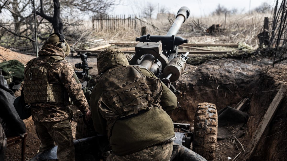DONETSK OBLAST, UKRAINE - FEBRUARY 23: Ukrainian soldiers wait for orders next to L119 artillery, as Russia-Ukraine war continues in the direction of Marinka, Donetsk Oblast, Ukraine, 23 February 2024. Saturday, February 24, 2024 marks the second anniversary of the Russia-Ukraine war. (Photo by Diego Herrera Carcedo/Anadolu via Getty Images)