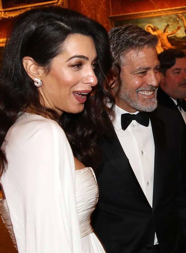 Amal Clooney i George Clooney na przyjęciu księcia Karola w pałacu Buckingham