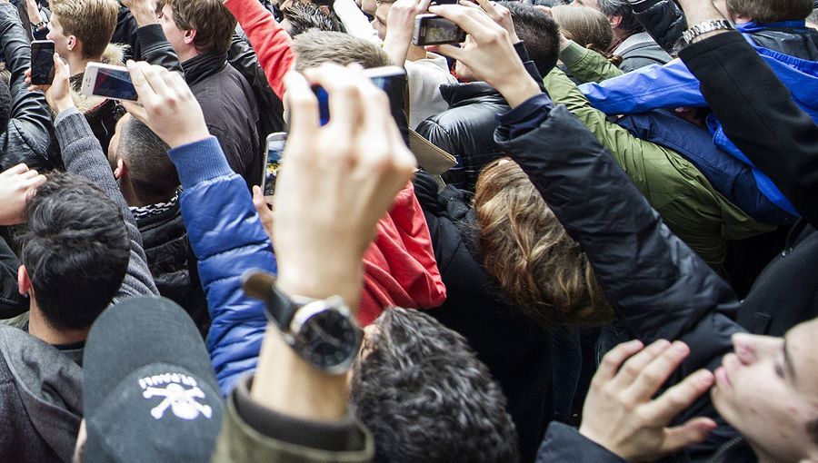 Fans wait outside of Barcelona's hotel in Munich