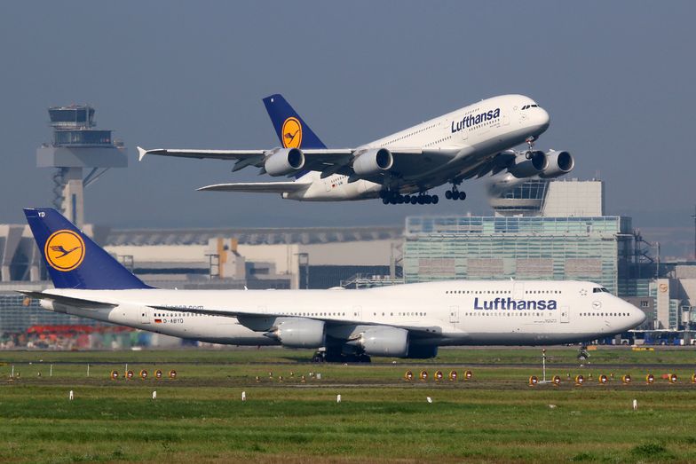 Frankfurt, Germany - September 17, 2014: Lufthansa Airbus A380 and Boeing 747 aircraft at Frankfurt Airport (FRA). Lufthansa is the German flag carrier and Europe's largest airline with some 665 planes. Frankfurt Airport is its biggest hub. (Frankfurt