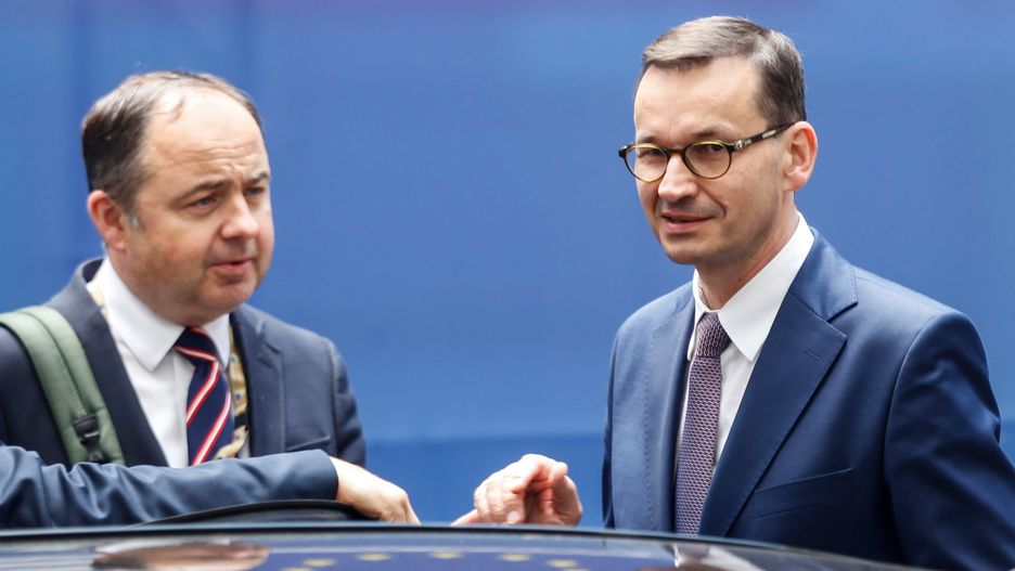 Premier Mateusz Morawiecki i wiceminister spraw zagranicznych Konrad Szymański
