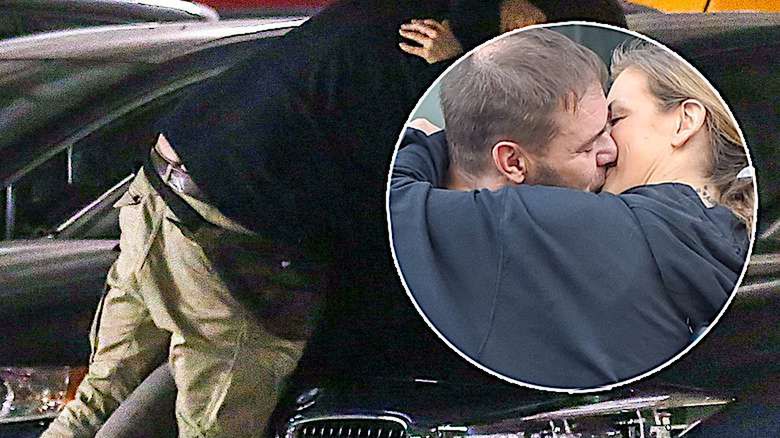 Tomasz Karolak i Magda Malicka całują się na masce auta