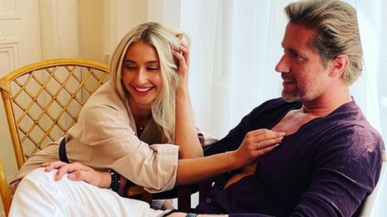 Szarmancki Robert Kochanek nosi Kingę na rękach