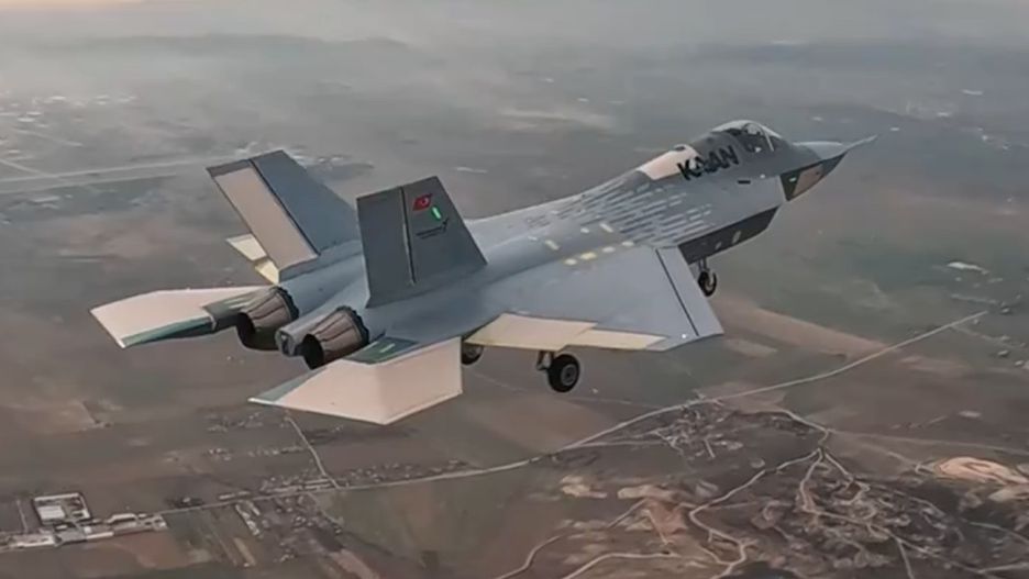 ANKARA, TURKIYE - FEBRUARY 21: (----EDITORIAL USE ONLY - MANDATORY CREDIT - 'TURKISH DEFENCE INDUSTRY AGENCY - HANDOUT' - NO MARKETING NO ADVERTISING CAMPAIGNS - DISTRIBUTED AS A SERVICE TO CLIENTS----) A screen grab captured from a video shared by Haluk Gorgun, President of Defense Industries in his social media accounts shows Turkish fighter jet KAAN conducting maiden flight in Ankara, Turkiye on February 21, 2024. (Photo by Turkish Defence Industry Agency/Anadolu via Getty Images)