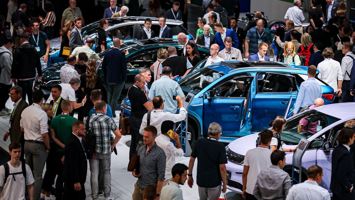 MUNICH, GERMANY - SEPTEMBER 5: Visitors look at electric cars of Chinese car brand BYD at the IAA Mobility 2023 international motor show on September 6, 2023 in Munich, Germany. This year's IAA is running from September 5 to September 10 at the Munich trade fair grounds and at several other locations across the city. (Photo by Leonhard Simon/Getty Images)