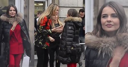 Edyta Herbuś w czerwonym garniturze wychodzi z butiku Joanny Klimas