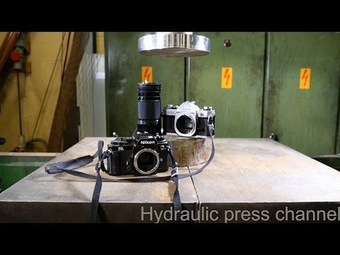 Co jest wytrzymalsze – Canon czy Nikon? Oto test ostateczny pod naciskiem prasy hydraulicznej