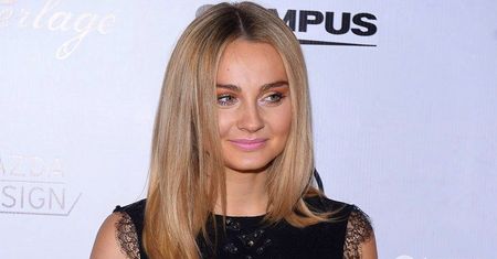 Stylowa Małgorzata Socha na pokazie Łukasza Jemioła. Gwiazda udowodniła, że czarna sukienka nie musi być wcale nudna