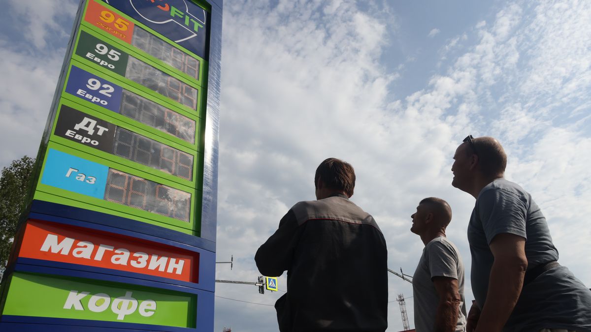 DEDOVSK, RUSSIA - AUGUST 07: Employees at a private gas station set up an electronic panel displaying fuel prices, on August 7, 2026, in Dedovsk, Russia. A fuel crisis continues to unfold in Russia, caused by regular Ukrainian drone attacks on oil refineries. (Photo by Contributor/Getty Images)
