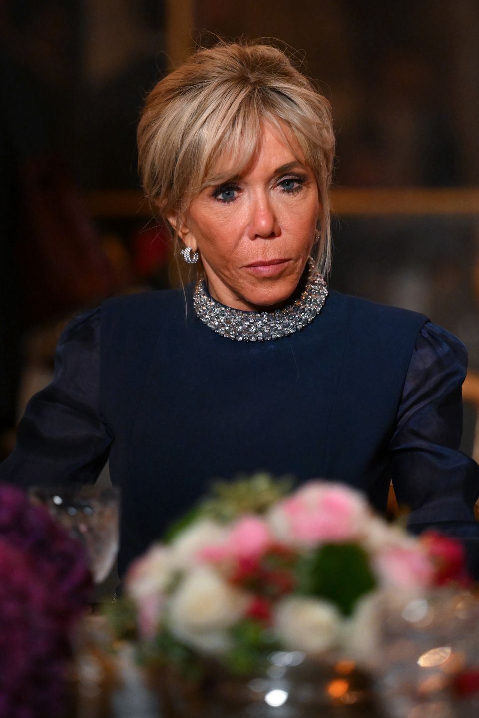 Emmanuel i Brigitte Macron na wieczornym spotkaniu z brytyjską parą królewską