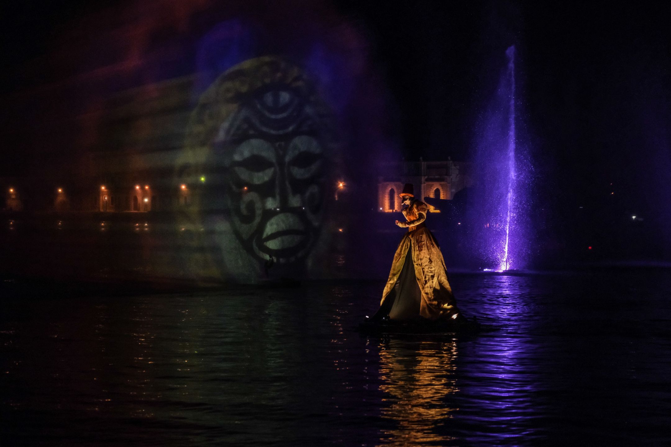 VENICE, ITALY - FEBRUARY 10: Artist performs by boat during the "Original Signs" show at the Venice Carnival, organized by VelaSpa, at Arsenale on February 10, 2023 in Venice, Italy. The Venice Carnival 2023, titled "Take Your Time for the Original Signs," began on February 4th and ends on February 21st. (Photo by Stefano Mazzola/Getty Images)