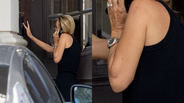 Izabela Janachowska zasłania się parasolem w drodze do samochodu