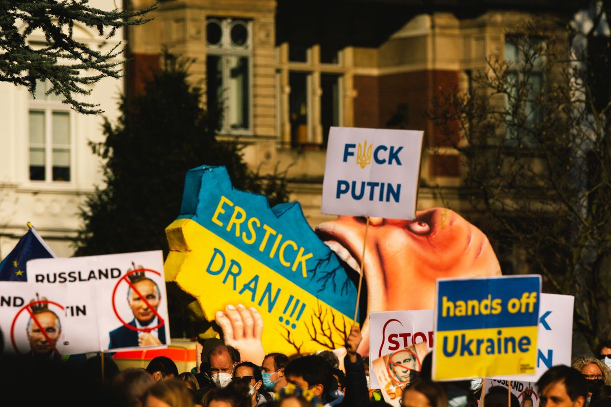 a carnival float depicting Russian president Vladimir Putin swallow the Ukraine in his mouth is seen during the anti war protest in Duesseldorf, Germany on March 5, 2022 (Photo by Ying Tang/NurPhoto via Getty Images)