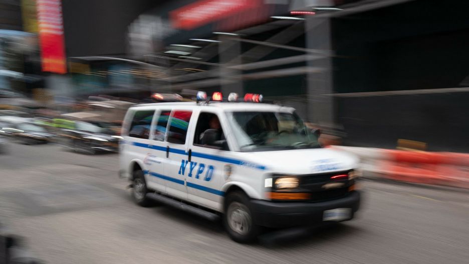 TemporaryNew York Police Department (NYPD) officers patrol near Time Square on October 5, 2021 in New York. (Photo by Bryan R. Smith / AFP)BRYAN R. SMITH