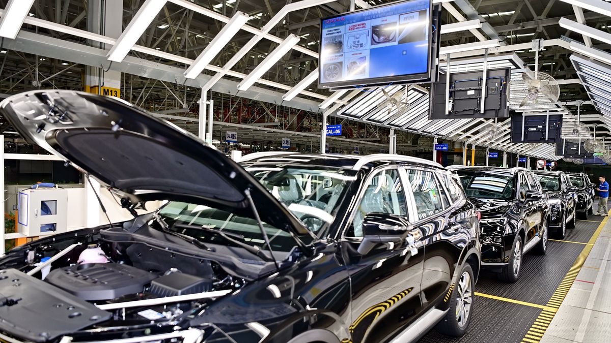 NANCHANG, CHINA - MAY 17: An employee works on the assembly line of electric vehicles in a digital automotive factory of Jiangling Motors on May 17, 2024 in Nanchang, Jiangxi Province of China. (Photo by Zhu Haipeng/VCG via Getty Images)