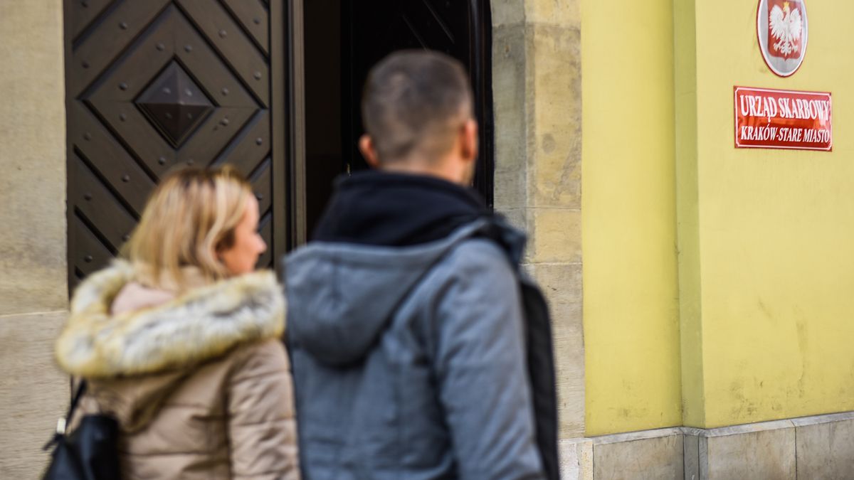 KRAKOW, POLAND - 2019/09/18: People walk past a Tax Office at the city centre in Krakow.
The ruling government party, Law and Justice party has announced several new social welfare packages ahead of the Parliamentary elections such has "500+" child program to cover all children, a bonus payment  for retirees  exempting workers under 26 from income tax among others. (Photo by Omar Marques/SOPA Images/LightRocket via Getty Images)