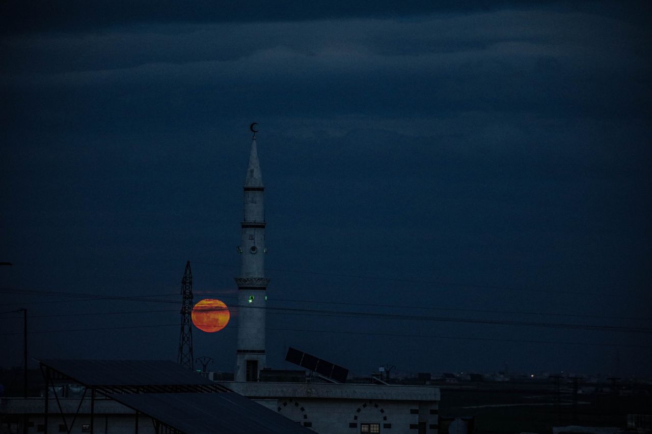 IDLIB, SYRIA - MARCH 25: Full moon rises over Idlib, Syria on March 25, 2023. (Photo by zettin Kasm/Anadolu via Getty Images)