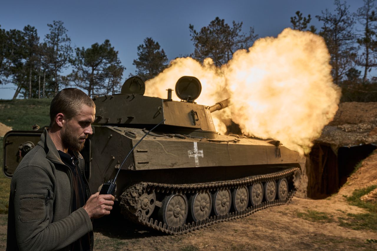 Ukrainian soldiers operating the 2S1 Gvozdika howitzer in the Kherson region, 27 April 2024.