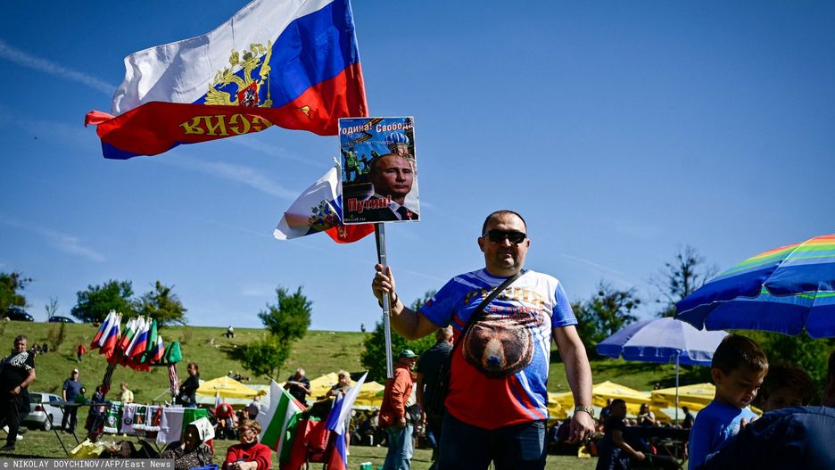 Temporary
A man poses for a picture with a Russian national flag and a picture of the Russian President Vladimir Putin, during the annual "Russophiles meet", near the central Bulgarian town of Kalofer, on September 25, 2022. - Russian songs, red flags and t-shirts bearing the image of Vladimir Putin: the war in Ukraine has not shaken the convictions of Bulgarian Russophiles, who gathered on Sunday in a festive atmosphere. (Photo by Nikolay DOYCHINOV / AFP)
NIKOLAY DOYCHINOV