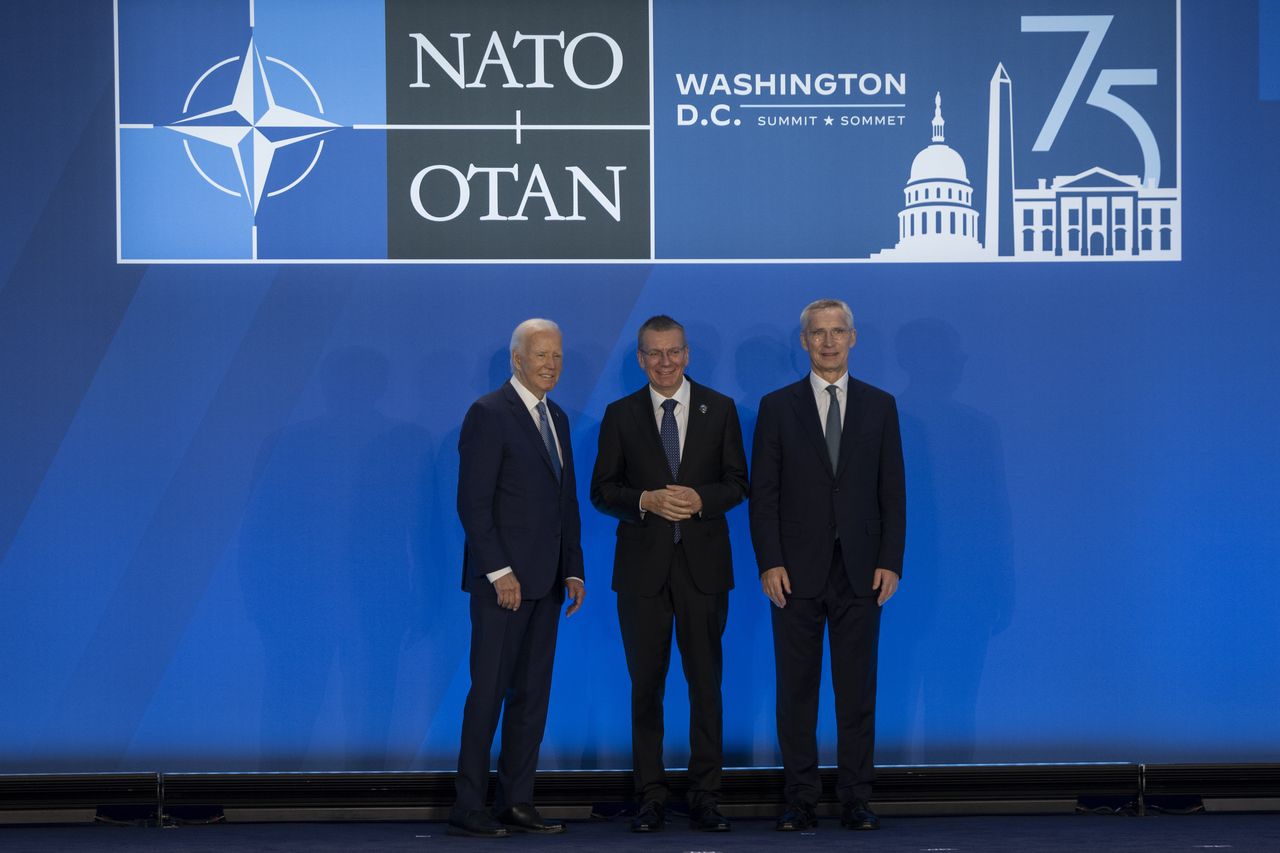 WASHINGTON DC, UNITED STATES - JULY 10: Latvian President Edgars Rinkevics (C), U.S. President Joe Biden (L) and NATO Secretary General Jens Stoltenberg (R) pose for a photo at the NATO leaders' summit on July 10, 2024 in Washington DC, United States. (Photo by Celal Gunes/Anadolu via Getty Images)