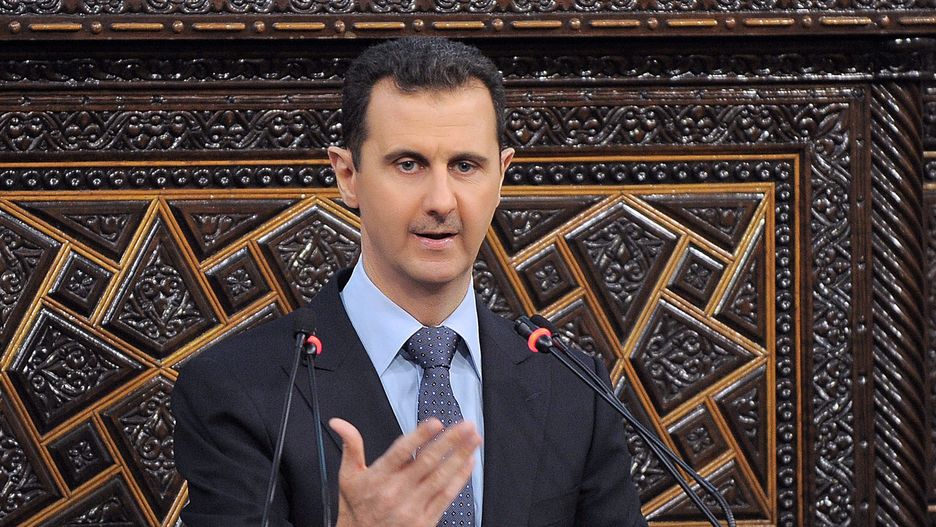 Bashar Assad opens Parliament
epa03247624 A handout picture released by Syrian news agency SANA shows Syrian President Bashar Assad addressing the Syrian Parliament members during the first parliamentary session, in Damascus, Syria, 03 June 2012. In a 70 minutes speech Assad defended the political reforms implemented by his government and blamed terrorists and foreign powers for the country's violence.  EPA/SYRIAN NEWS AGENCY SANA/HO
Dostawca: PAP/EPA.
SYRIAN NEWS AGENCY SANA/HO