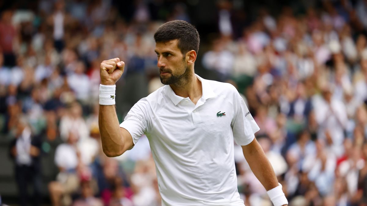 Novak Djokovic of Serbia reacts after winning the third set poiunt against Andrey Rublev of Russia during their Men's Singles quarter final match at the Wimbledon Championships, Wimbledon, Britain, 11 July 2023. EPA/TOLGA AKMEN EDITORIAL USE ONLY Dostawca: PAP/EPA.