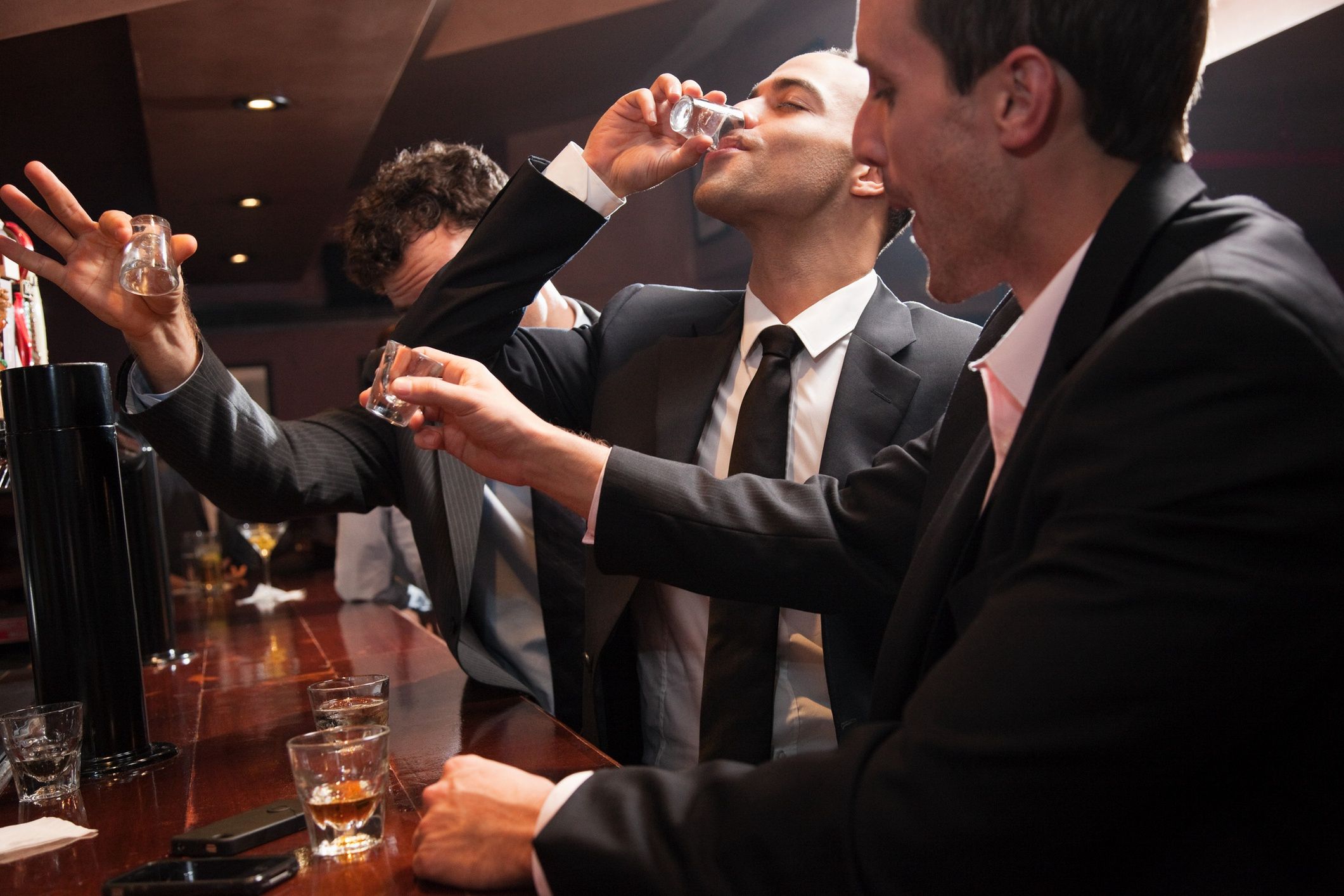 Businessmen drinking shots in barImage Sourceconsumption, drinking, male, man, adult, human condition, drunkenness, people, alcoholic, alcoholic beverages, drink, lad, young, young man, young adult, colleague, business, businessman, businesspeople, shots, downing, shot glass, shot, glasses, glass, drinking glass, tableware, suit, clerk, office worker, indoors, group, three people, small group of people, group of people, habit, alcoholism, addiction, interaction, demanding, communication, communicating, boys night out, leisure, nightlife, night out, after work, mid adult man, mid adult, only men, only adults, companion, friendship, bare, empty, 30 to 34 years, 25 to 29 years, caucasian, ethnic, latin american, latin, hispanic, hispanic ethnicity, multi-ethnic, multi ethnic, mixed race, mixed, mix, mixed race ethnicity, ordering, socialising, recreation, laddish, close, togetherness, new york city, usa