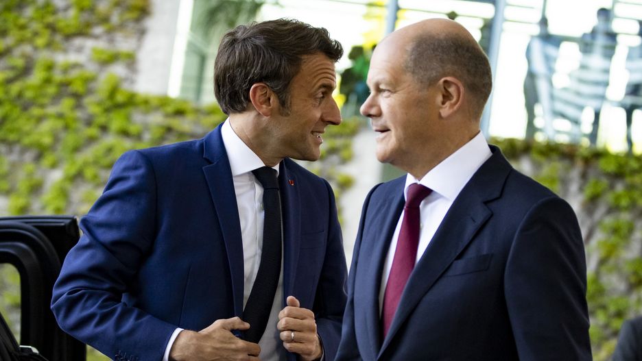 German Chancellor Olaf Scholz greets French President Emmanuel Macron upon his arrival at the Chancellery in Berlin, Germany on May 9, 2022. (Photo by Emmanuele Contini/NurPhoto via Getty Images)
