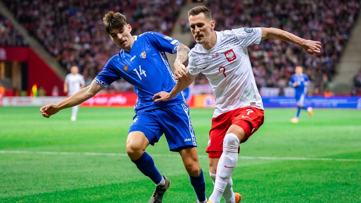 WARSAW, POLAND - 2023/10/15: Artur Craciun (L) of Moldova and Arkadiusz Milik (R) of Poland are seen in action during the UEFA EURO 2024 qualifying match between Poland and Moldova at PGE Narodowy Stadium. 
Final score; Poland 1:1 Moldova. (Photo by Mikolaj Barbanell/SOPA Images/LightRocket via Getty Images)