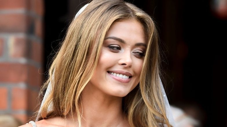 Joanna Opozda prezentuje ciążowy brzuch w salonie masażu