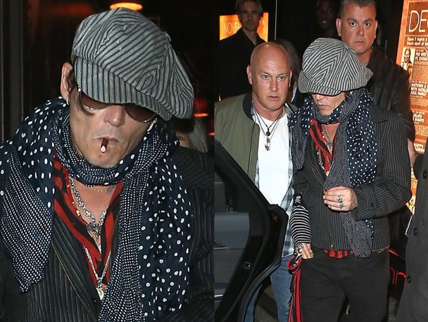 Wyluzowany Johnny Depp opuszcza klub z cygarem w ustach (ZDJĘCIA)