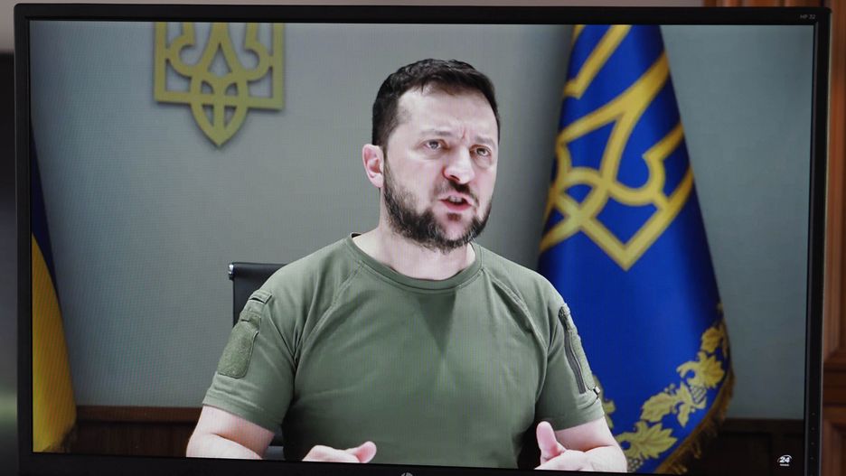 GARHAM, BAVARIA, GERMANY - 2022/07/14: In this photo illustration, a screen showing president of Ukraine Volodymyr Zelensky's speech before the members of the international tribunal in The Hague. He accused the Russian authorities of war crimes and international terrorism. (Photo Illustration by Igor Golovniov/SOPA Images/LightRocket via Getty Images)