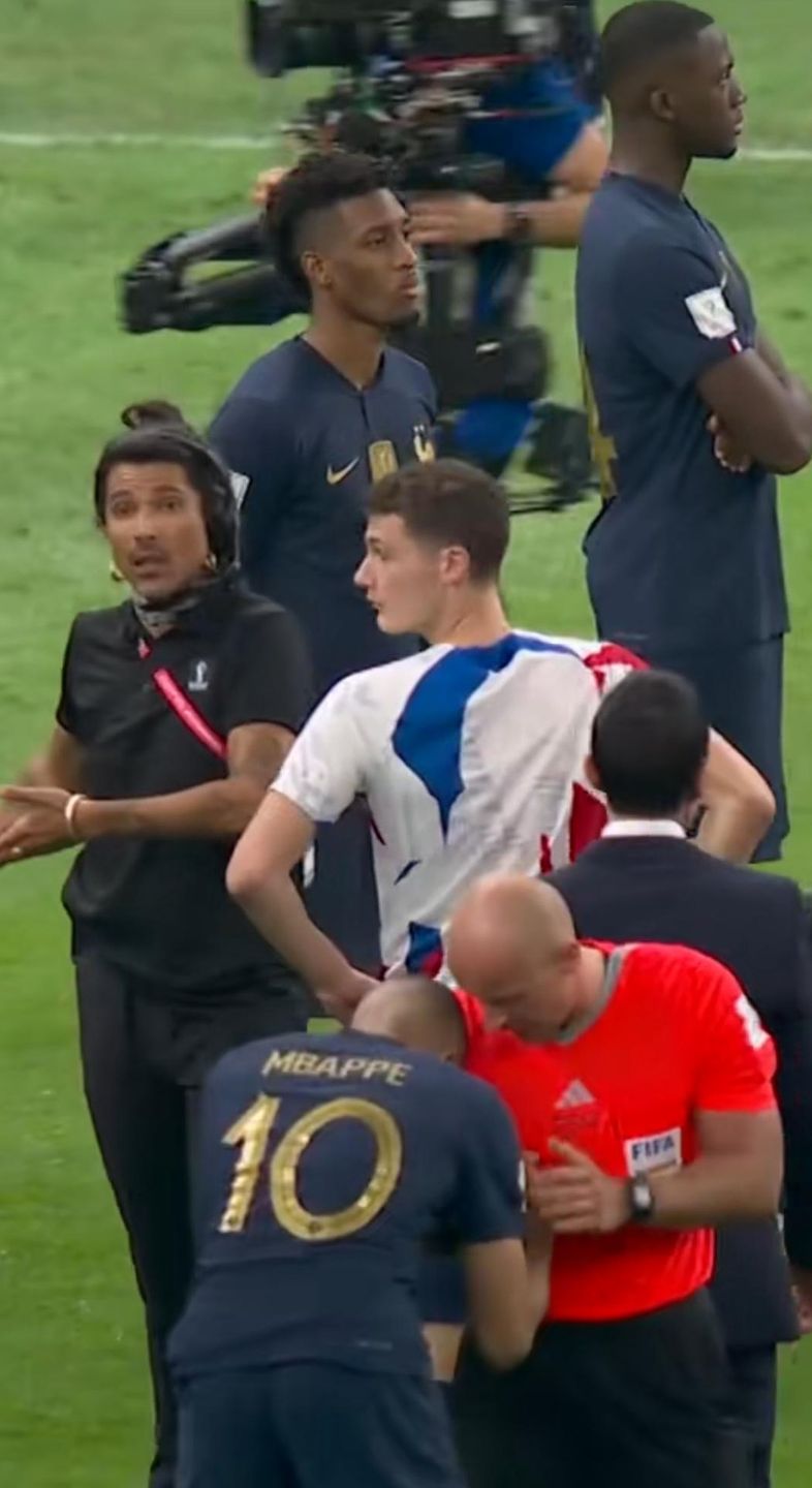 Szymon Marciniak i Kyliam Mbappe