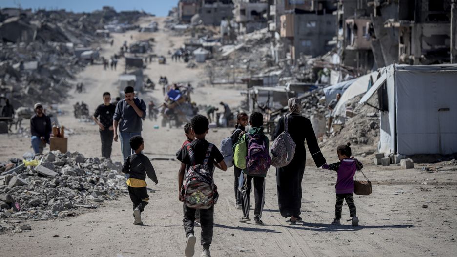 GAZA STRIP - MAY 21: Palestinian residents flee the conflict zones by car, on donkey carts, and on foot, carrying their belongings to safer areas following intense Israeli military attacks on the Jabalia Refugee Camp in northern Gaza on May 21, 2025. (Photo by Saeed M. M. T. Jaras/Anadolu via Getty Images)