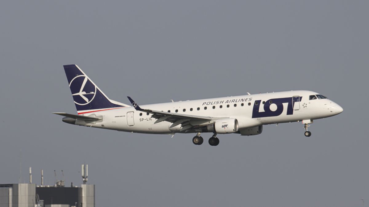 Polish Airlines LOT Embraer ERJ-175 aircraft as seen on final approach flying, arriving for landing at the runway of Amsterdam Schiphol AMS EHAM Airport. The Brazilian-made narrow body airplane is a regional Embraer ERJ 175 with the registration SP-LIC. LOT Polish Airlines, legally incorporated as Polskie Linie Lotnicze LOT S.A. is the flag carrier airline of Poland and a member of the Star Alliance aviation group. The aviation industry and passenger traffic are phasing a difficult period with the Covid-19 coronavirus pandemic having a negative impact on the travel business industry with fears of the deteriorating situation due to the new Omicron variant mutation. Amsterdam, the Netherlands on April 1, 2021 (Photo by Nicolas Economou/NurPhoto via Getty Images)