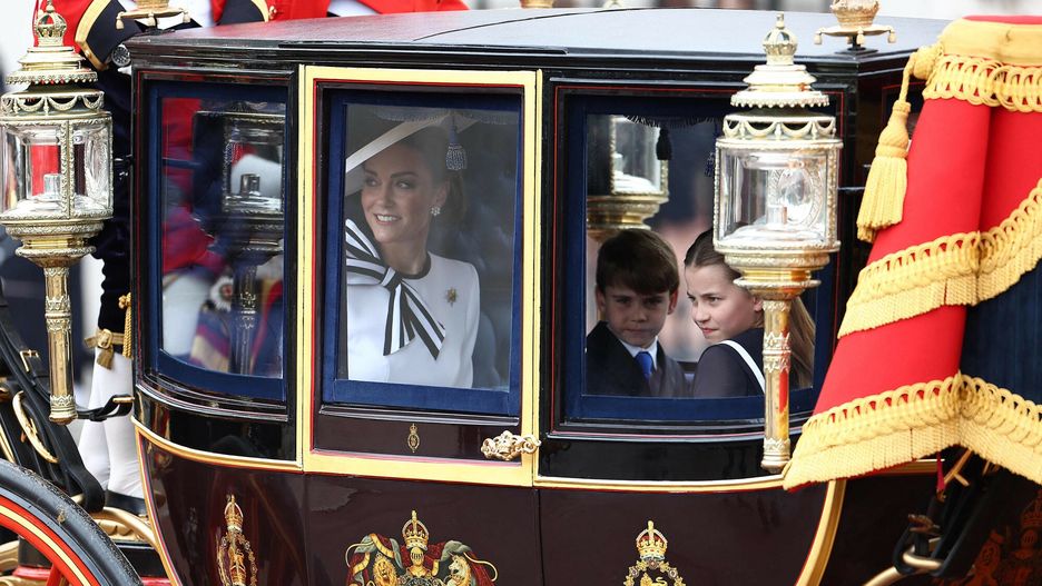 Temporary
Britain's Catherine, Princess of Wales, smiles next to Britain's Princess Charlotte of Wales (R) and Britain's Prince Louis of Wales (C) inside the Glass State Coach on their way to Horse Guards Parade for the King's Birthday Parade "Trooping the Colour" in London on June 15, 2024. Catherine, Princess of Wales, is making a tentative return to public life for the first time since being diagnosed with cancer, attending the Trooping the Colour military parade in central London. (Photo by HENRY NICHOLLS / AFP)
HENRY NICHOLLS