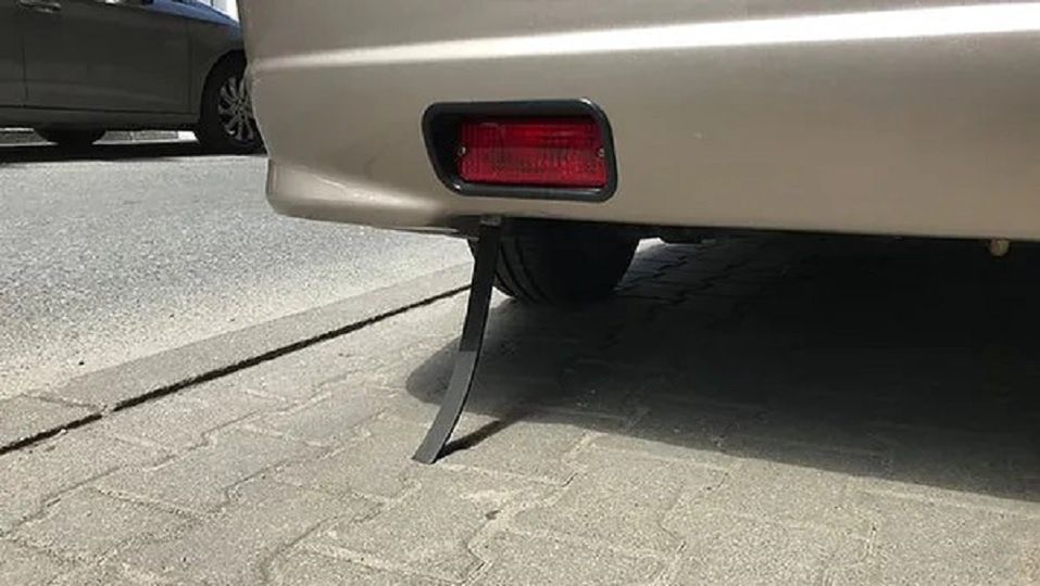 Do you remember the rubber strips under cars? We know why they disappeared