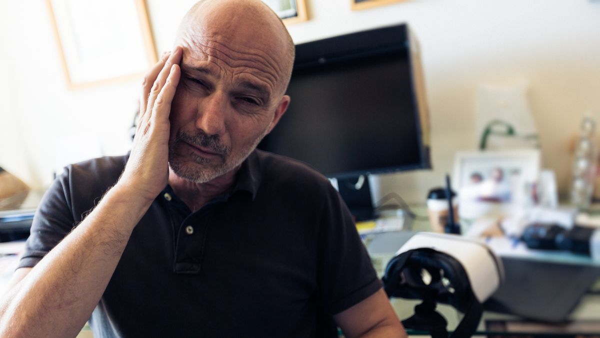 Adult man suffering from cyber sickness after using VRAdult man suffering from cyber sickness after using VRnullplusCandid, Computer, Cyberspace, Photography, Electrical Equipment, Men, Males, 3-D Glasses, Stereoscopic Image, Domestic Life, Electronics Industry, Headache, Pain, Adult, Watching, Looking, Caucasian Ethnicity, One Person, White, Entertainment, Indoors, Completely Bald, Balding, Illness, People, Home Interior, Office, Virtual Reality Simulator, Computer Monitor, Watching Movie, Smart Glasses - Eyewear, Wearable Computer, Wearable Computing, CreativeContentBrief, 603438805