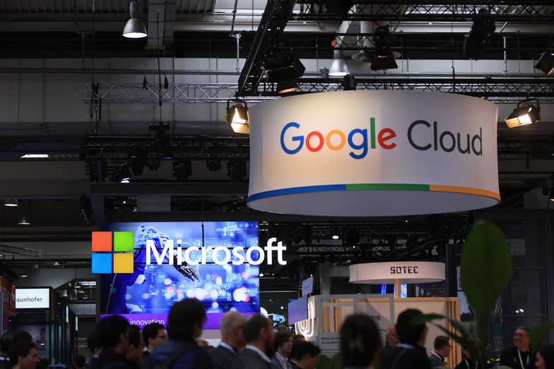 The Microsoft Corp. and a Google Cloud stands at the Hannover Messe industrial technology fair in Hanover, Germany, on Thursday, April 20, 2023. The German government must adopt more cautious fiscal policies that complement the European Central Bank's efforts to tackle inflation in order to help the economy, the country's deputy finance minister, Florian Toncar, told Bloomberg Television. Photographer: Krisztian Bocsi/Bloomberg via Getty Images