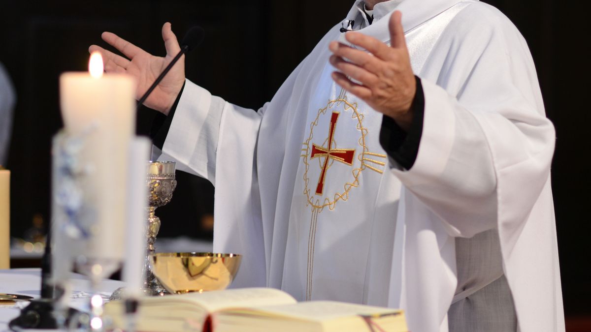 priest and worship at the altar