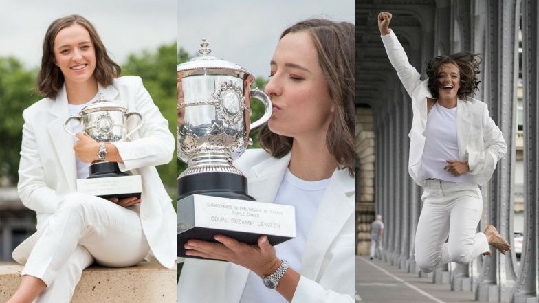 Iga Świątek w sesji zdjęciowej z pucharem na moście Bir-Hakeim