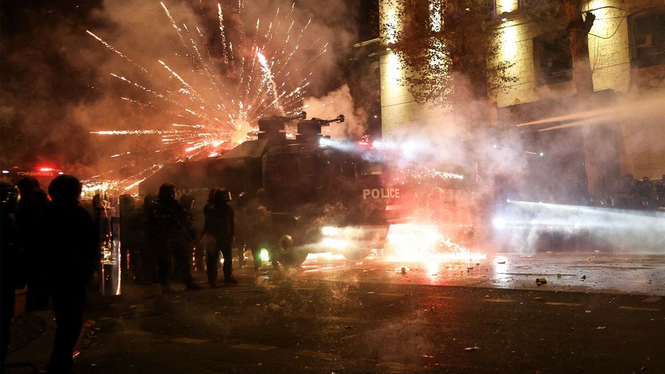 Temporary
Protesters shoot fireforks toward police during a fourth day of nationwide protests against a government decision to shelve EU membership talks in Tbilisi early on December 2, 2024. Police in Georgia fired tear gas and water cannon on a fourth straight day of pro-EU protests that drew tens of thousands of people, as the prime minister rebuffed calls for new elections. (Photo by Giorgi ARJEVANIDZE / AFP)
GIORGI ARJEVANIDZE
