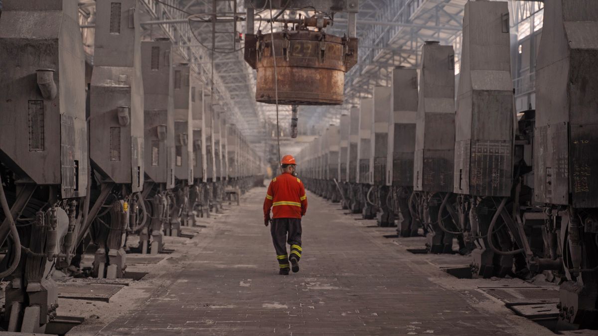 A worker at the Aluminum of Greece plant, a unit of Metlen Group, in Agios Nikolaos, Viotia, Greece, on Tuesday, April 1, 2025. President Donald Trump said he would be imposing both broad reciprocal tariffs and additional sector-specific tariffs on April 2. Photographer: Nick Paleologos/Bloomberg via Getty Images