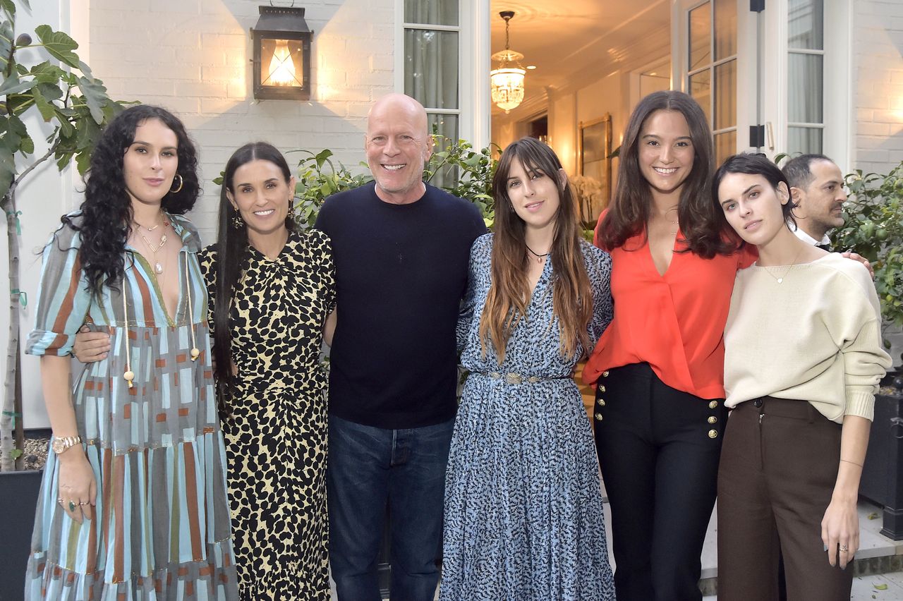 Bruce Willis with his wives and daughters