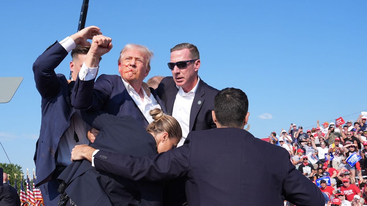 BUTLER, PENNSYLVANIA - July 13: Former president Donald Trump raises his arm with blood on his face during a campaign rally for former President Donald Trump at Butler Farm Show Inc. on Saturday, July 13, 2024 in Butler, Pa. Trump ducked and was taken offstage after loud noises were heard after he began speaking. 
(Photo by Jabin Botsford/The Washington Post via Getty Images)